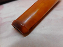 Load image into Gallery viewer, A boxed amber cheroot holder. 9ct gold band. Edwardian.