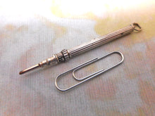 Load image into Gallery viewer, A very small silver propelling pencil. c1900