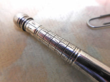 Load image into Gallery viewer, SOLD........A silver perpetual calendar / tooth pick. 18th century.