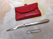 Laden Sie das Bild in den Galerie-Viewer, A small red leather case from a Georgian sewing box. c 1800