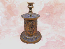 Load image into Gallery viewer, A pressed gilt metal vesta / go to bed. Late Victorian c 1890