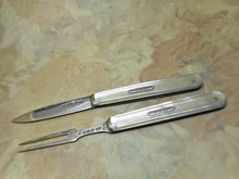 Load image into Gallery viewer, An elegant pearl handled folding knife and matching fork. HM 1844