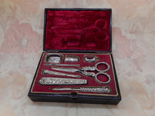 Load image into Gallery viewer, A Regency maroon leather sewing set / etui. English c1835.