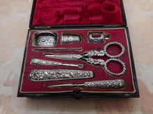 Load image into Gallery viewer, A Regency maroon leather sewing set / etui. English c1835.