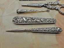 Load image into Gallery viewer, A Regency maroon leather sewing set / etui. English c1835.