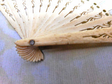 Load image into Gallery viewer, A doll's pierced bone fan.  c1870