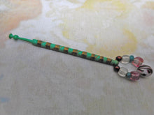 Load image into Gallery viewer, A vibrant green lace bobbin with brass wiring. c 1850