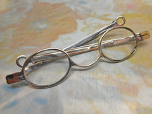 Load image into Gallery viewer, A shagreen spectacle case fitted with silver eye glasses. HM 1812.