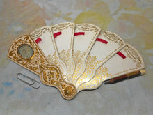 Load image into Gallery viewer, A fan shaped Carnet de Bal with inset mirror. Mid 19th century.