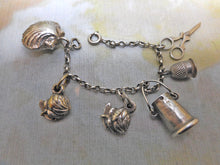 Load image into Gallery viewer, A child's vintage silver charm bracelet. French. 20th century.