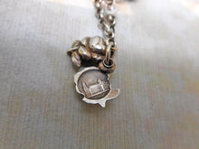 Load image into Gallery viewer, A child's vintage silver charm bracelet. French. 20th century.