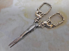 Load image into Gallery viewer, A pair of silver 'dog' handled scissors. c 1840