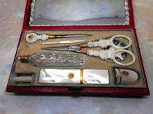 Load image into Gallery viewer, A Palais Royal red leather etui with pearl fittings. French c 1800