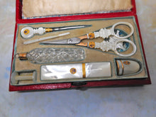 Load image into Gallery viewer, A Palais Royal red leather etui with pearl fittings. French c 1800
