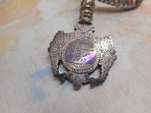 Load image into Gallery viewer, A cut steel hemming clamp with netting post and reel holder. Dated 1857.