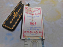 Load image into Gallery viewer, A 1906 diary in its tooled leather slip case.