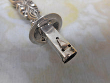 Laden Sie das Bild in den Galerie-Viewer, Ein silberner Siegelwachshalter. Um 1900