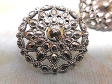 Load image into Gallery viewer, Three matching 18th century cut steel buttons.