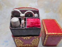Load image into Gallery viewer, SOLD……..A fitted, gold tooled, red leather sewing set / etui. c1840.