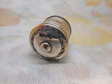Load image into Gallery viewer, An engraved silver tape measure. c 1800