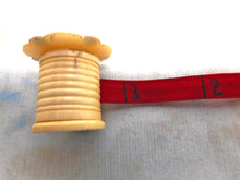 Charger l'image dans la galerie, VENDU.......Un cirage à fil surmonté de nacre, un mètre ruban et un coussin d'émeri. c1850