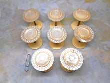 Load image into Gallery viewer, A set of 8 mother of pearl topped reels / spools. c1850