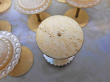 Load image into Gallery viewer, SOLD…….A set of 8 mother of pearl topped reels / spools. c1850