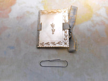 Load image into Gallery viewer, SOLD……An engraved mother of pearl needle case in the form of a book. c 1850