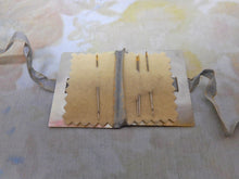 Load image into Gallery viewer, SOLD……An engraved mother of pearl needle case in the form of a book. c 1850