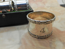 Load image into Gallery viewer, A set of 6 Mappin & Webb silver plated napkin rings. c1900