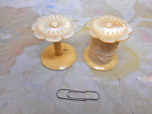 Load image into Gallery viewer, A pair of pearl topped reels / spools. c1830-1840