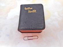 Load image into Gallery viewer, A silver prayer book holder with its prayer book. HM. 1903