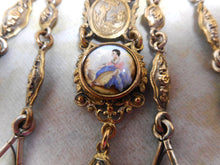 Load image into Gallery viewer, A white metal chatelaine with painted porcelain plaques. c1870 a/f