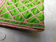 Load image into Gallery viewer, A green silk hussif decorated with chain stitches. c1830