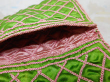 Load image into Gallery viewer, A green silk hussif decorated with chain stitches. c1830
