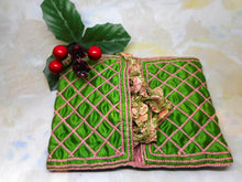 Load image into Gallery viewer, A green silk hussif decorated with chain stitches. c1830