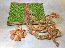 Load image into Gallery viewer, A green silk hussif decorated with chain stitches. c1830