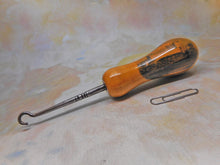 Load image into Gallery viewer, A Mauchline Ware button hook. c1890. Bamborough / Bambrugh Castle.