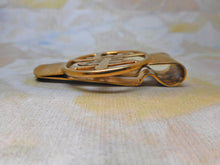 Load image into Gallery viewer, A silver gilt money clip with a Chinese character. 20th century