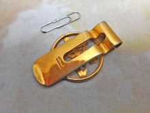 Load image into Gallery viewer, A silver gilt money clip with a Chinese character. 20th century