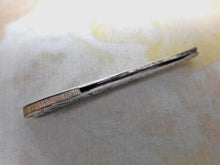 Load image into Gallery viewer, An engraved silver folding seam cutter. c1860