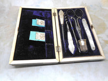 Load image into Gallery viewer, A mother of pearl clad sewing set / etui. c1870