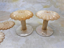 Load image into Gallery viewer, A pair of pearl topped reels with pearl bases. c1840.