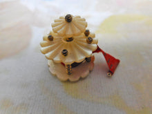 Load image into Gallery viewer, A mother of pearl 'bandstand' tape measure. c1850