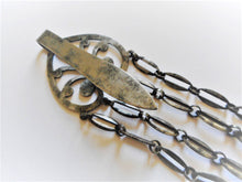 Load image into Gallery viewer, SOLD…….A long, decoratively engraved, cut steel chatelaine with six appendages. c 1850.