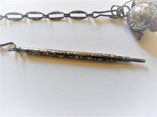Load image into Gallery viewer, SOLD…….A long, decoratively engraved, cut steel chatelaine with six appendages. c 1850.