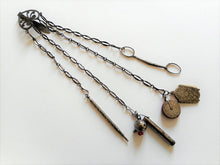 Load image into Gallery viewer, An engraved 19th century cut steel sewing chatelaine.