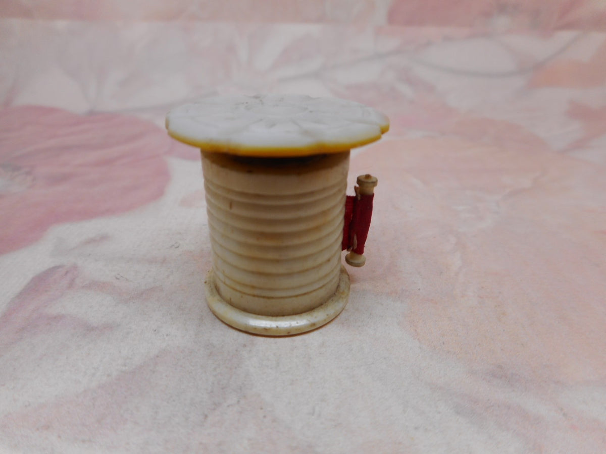 http://curiocabinetantiques.com/cdn/shop/products/hz40-complete-pearl-topped-tape-measure_2_1200x1200.jpg?v=1671698849