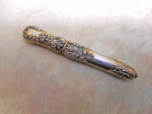 Laden Sie das Bild in den Galerie-Viewer, A French silver gilt needle case. c 1870