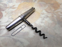 Load image into Gallery viewer, A silver handled, folding pocket corkscrew. 1894
